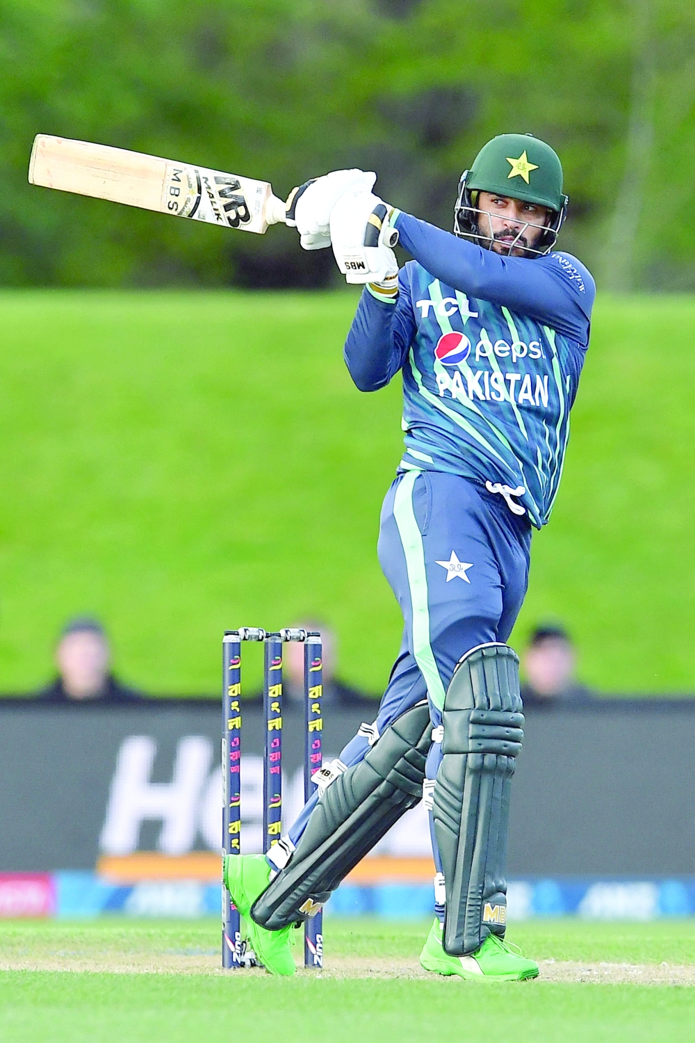 Pakistan's Mohammad Nawaz plays a shot during the Twenty20 tri-series cricket match between Pakistan and Bangladesh at Hagley Oval in Christchurch on October 13, 2022. (Photo by Sanka Vidanagama / AFP)