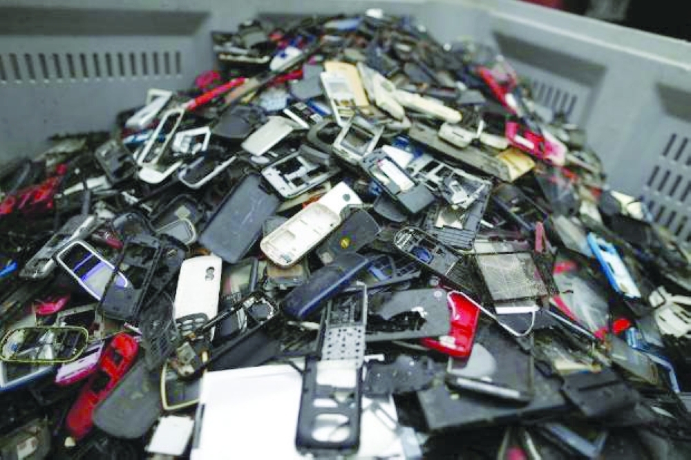 Mobile phones contain valuable materials like gold, copper, silver, palladium and other recyclable components. -- AFP 