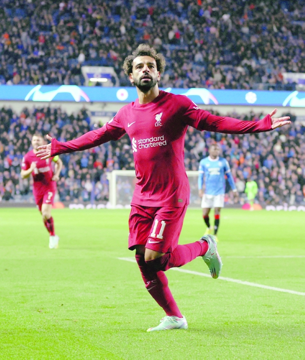 Soccer Football - Champions League - Group A - Rangers v Liverpool - Ibrox Stadium, Glasgow, Scotland, Britain - October 12, 2022  Liverpool's Mohamed Salah celebrates scoring their sixth goal Action Images via Reuters/Lee Smith
