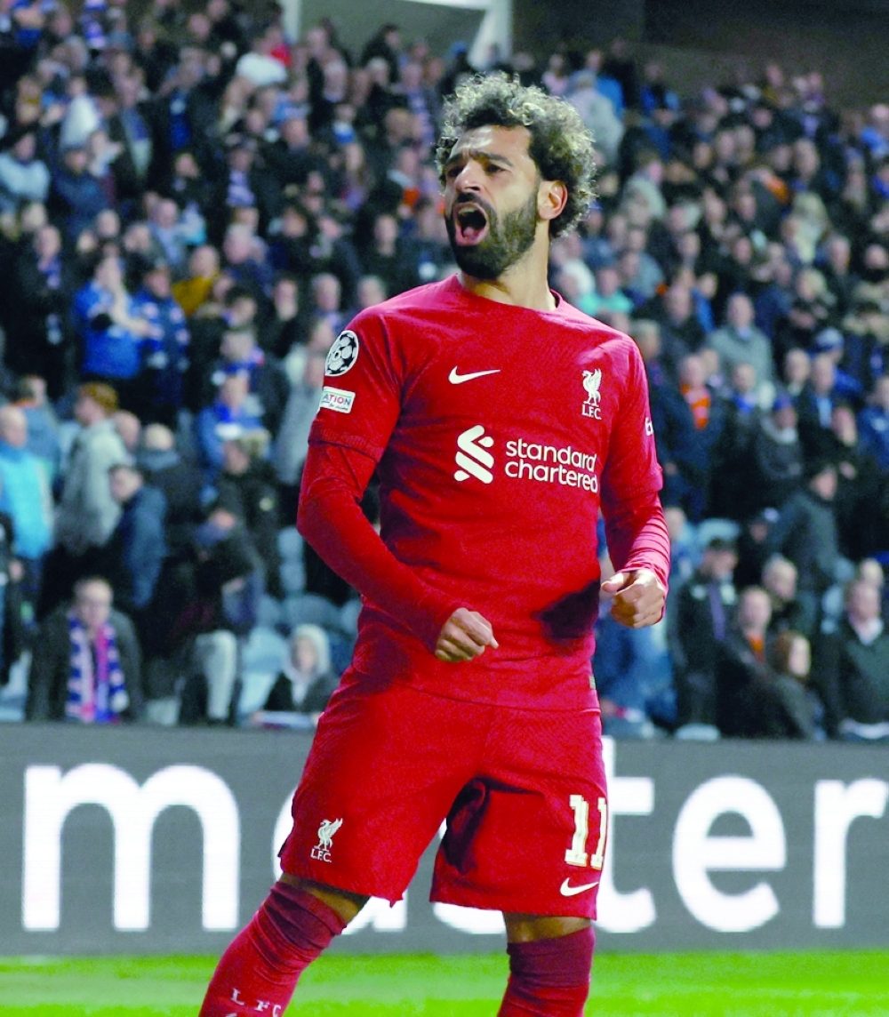 Soccer Football - Champions League - Group A - Rangers v Liverpool - Ibrox Stadium, Glasgow, Scotland, Britain - October 12, 2022  Liverpool's Mohamed Salah celebrates scoring their sixth goal Action Images via Reuters/Lee Smith
