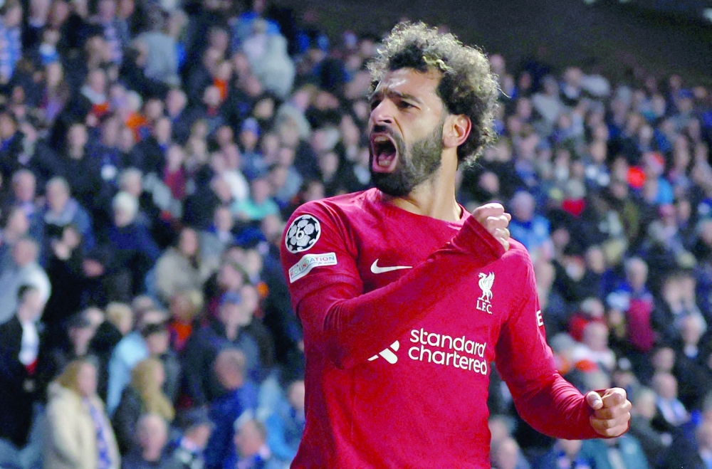 Soccer Football - Champions League - Group A - Rangers v Liverpool - Ibrox Stadium, Glasgow, Scotland, Britain - October 12, 2022  Liverpool's Mohamed Salah celebrates scoring their sixth goal Action Images via Reuters/Lee Smith
