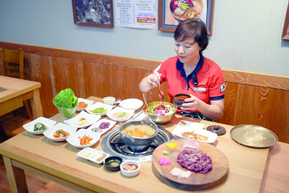 Proprietor Lee Da-yun at Haewol Hanwoo in Hampyeong County, Korea. (Chang W. Lee/The New York Times)