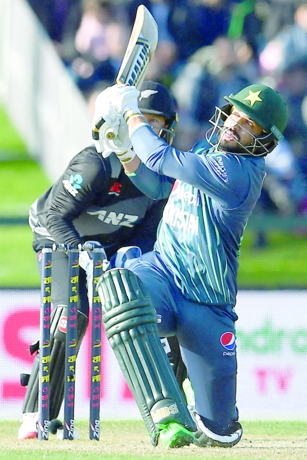 Pakistan's Mohammad Nawaz plays a shot during the Twenty20 tri-series final cricket match between New Zealand and Pakistan at Hagley Oval in Christchurch on October 14, 2022.  (Photo by Sanka Vidanagama / AFP)

