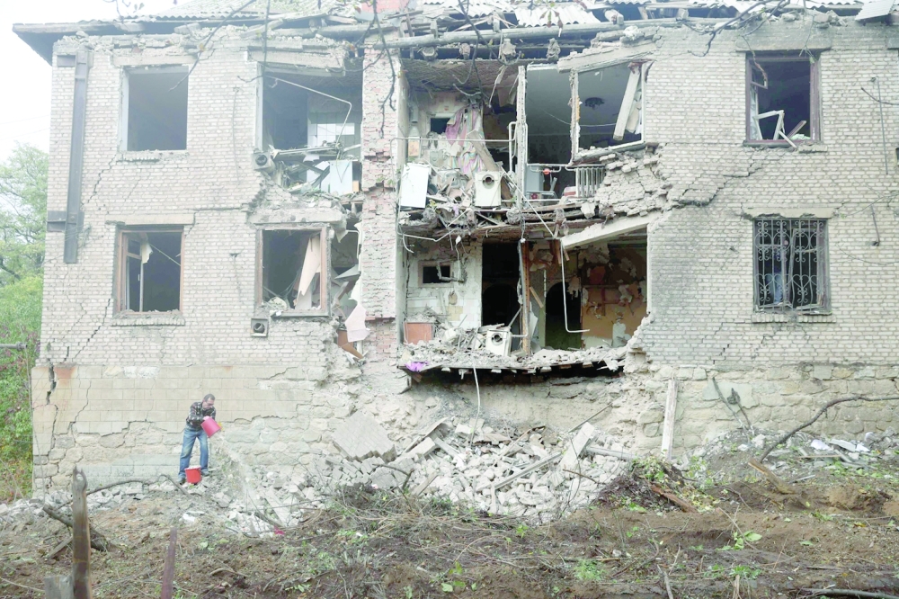 A residential building destroyed by a missile strike in Konstantinovka. -- AFP
