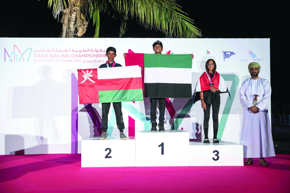 Top three overall winners of Optimist Class الفائزون على المراكز الثلاثة الأولى على المستوى العام لفئة الأوبتمست