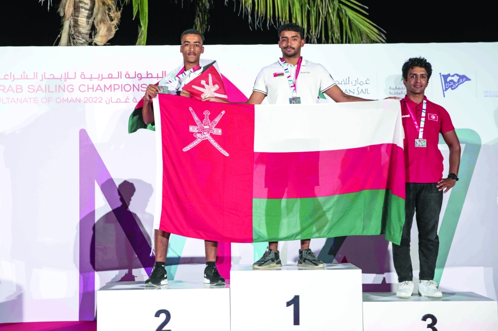 Top Three winners of IQ Foil class الفائزون بالمراكز الثلاثة الأولى في فئة الإي كيو فويل