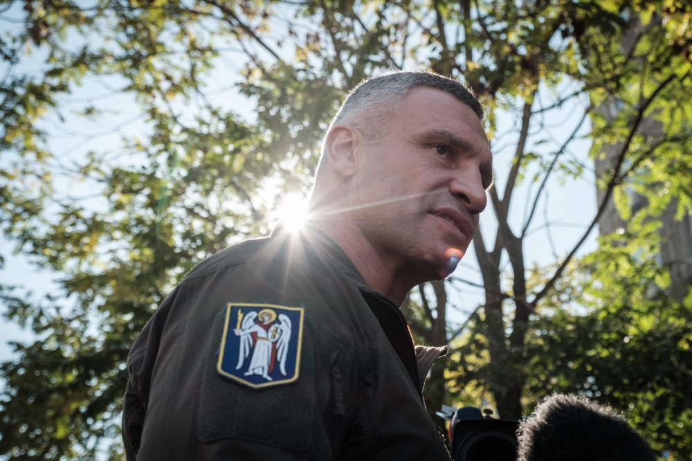 Kyiv mayor Vitali Klitschko speaks to press after a drone attack in Kyiv. - AFP
