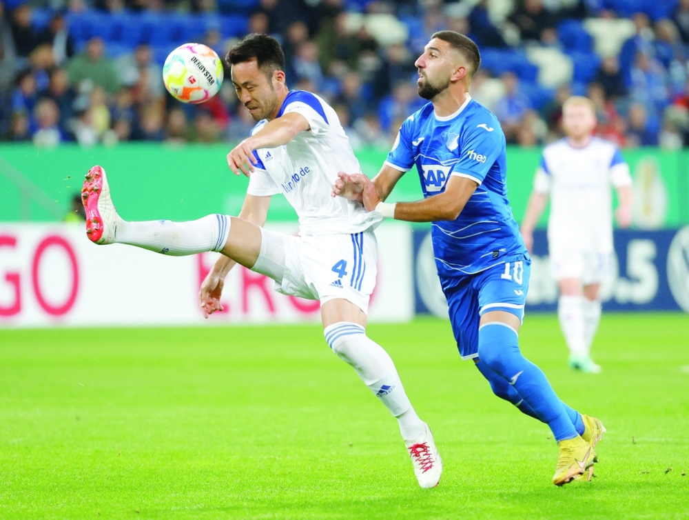 Schalke 04's Maya Yoshida in action with TSG 1899 Hoffenheim's Munas Dabbur REUTERS