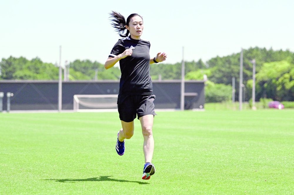 Japanese referee Yoshimi Yamashita training at a facility operated by the Japan Football Association (JFA) in Chiba. Yamashita is one of three women on the list of 36 referees for Qatar 2022 Fifa World Cup, alongside France's Stephanie Frappart and Rwanda's Salima Mukansanga. - To go with AFP story fbl-WC-2022-referee-JPN-Yamashita, PROFILE by Andrew MCKIRDY