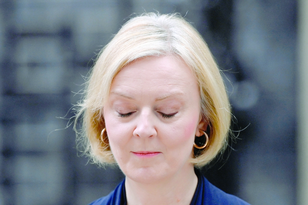 British Prime Minister Liz Truss announces her resignation, outside Number 10 Downing Street, London, Britain, on Thursday. - Reuters