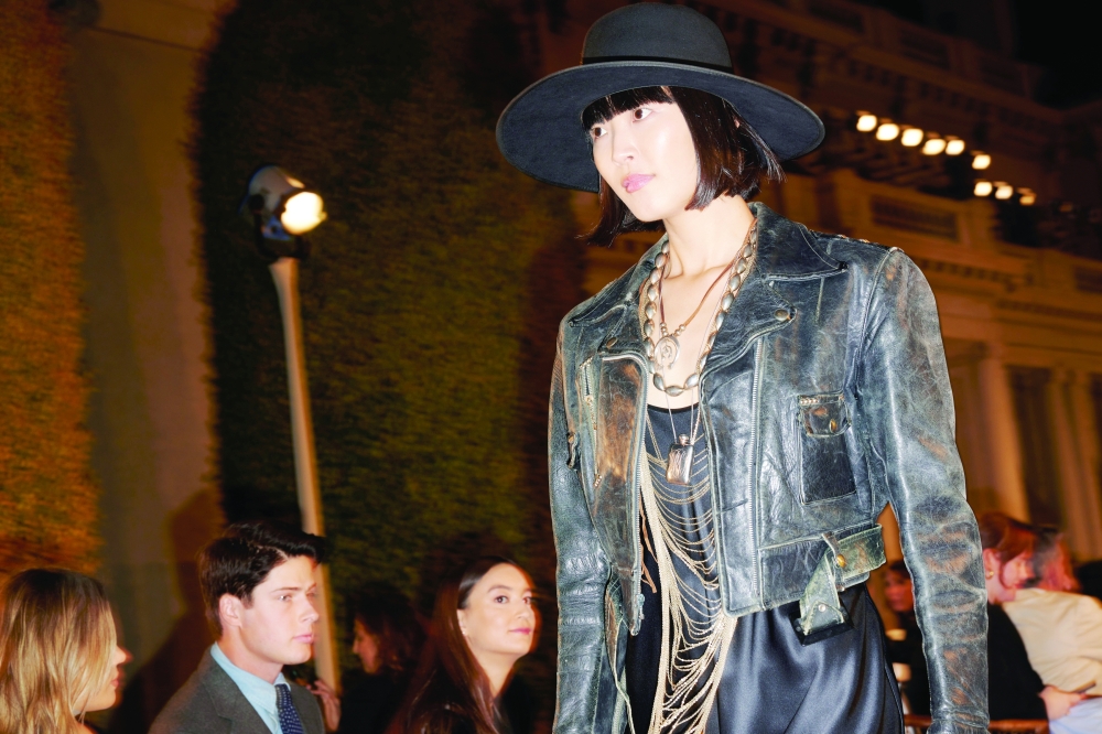 A model presents a look at the Ralph Lauren spring 2023 fashion show in San Marino, Calif., Oct. 13, 2022. (Maggie Shannon/The New York Times)