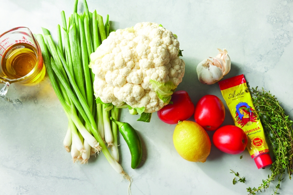  Melissa Clark’s Creamy Cauliflower Soup with Harissa Roasted Tomatoes, in New York on Oct. 4, 2022. (Bobbi Lin/The New York Times)
