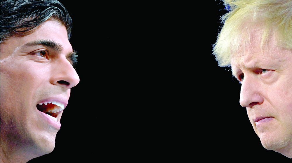 Boris Johnson and Rishi Sunak are leading potential contenders to replace Liz Truss. -- AFP