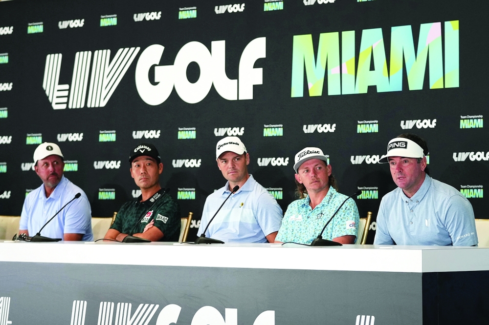 Oct 26, 2022; Miami, Florida, USA; Bubba Watson speaks while sitting next to Cameron Smith, Martin Kaymer, Kevin Na and Phil Mickelson during a press conference before the LIV Golf series at Trump National Doral. Mandatory Credit: Jasen Vinlove-USA TODAY Sports
