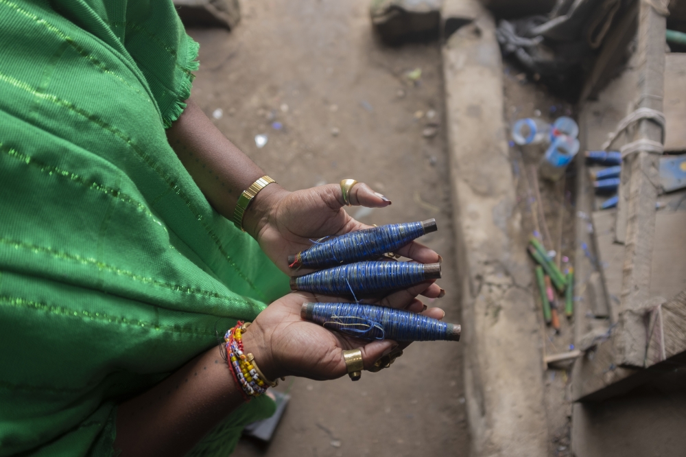 Designer Bubu Ogisi working in Lagos, Nigeria, on Sept. 17, 2022. (Stephen Tayo/The New York Times)