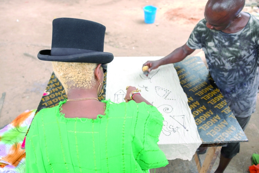 Designer Bubu Ogisi working in Lagos, Nigeria, on Sept. 17, 2022. (Stephen Tayo/The New York Times)