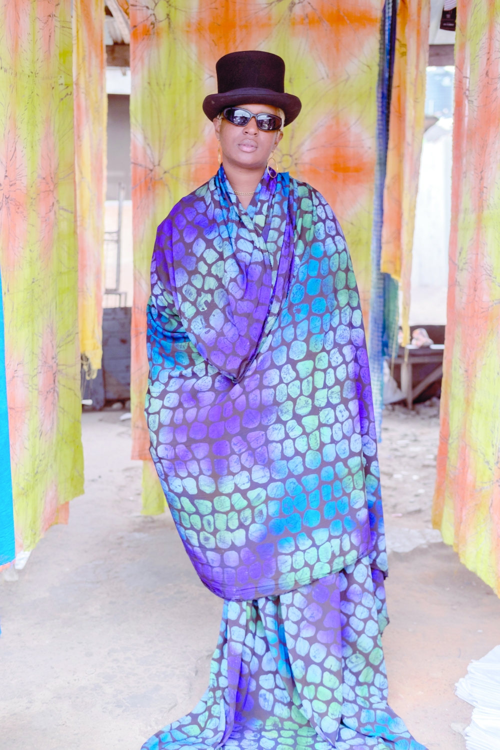 Designer Bubu Ogisi at a tie-dye workshop in Lagos, Nigeria, on Sept. 17, 2022. (Stephen Tayo/The New York Times)