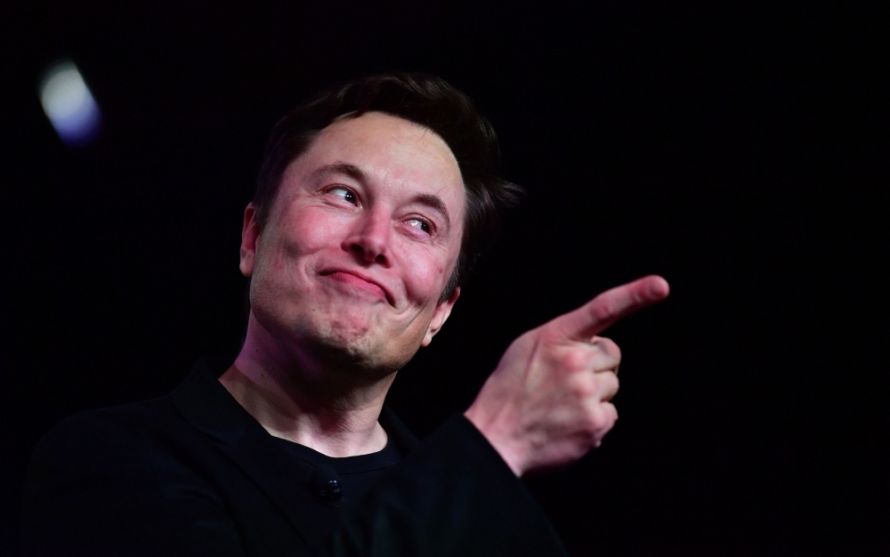 (FILES) In this file photo taken on March 14, 2019, Tesla CEO Elon Musk speaks during the unveiling of the new Tesla Model Y in Hawthorne, California.