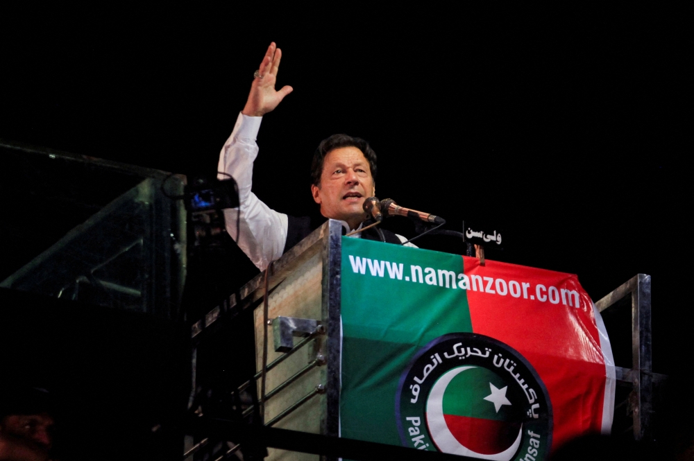 Ousted Pakistani Prime Minister Imran Khan gestures as he addresses supporters during a rally, in Lahore, Pakistan April 21, 2022.