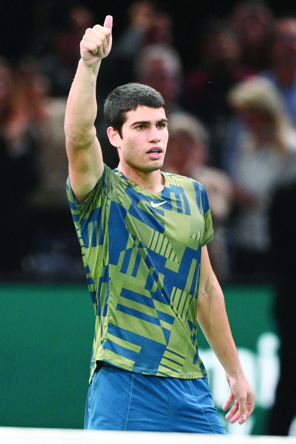 Spain's Carlos Alcaraz Garfia celebrates after winning against Bulgaria's Grigor Dimitrov at the end of their men's singles round of 8 tennis match on day four of the ATP World Tour Masters 1000 - Paris Masters (Paris Bercy) - indoor tennis tournament at The AccorHotels Arena in Paris on November 3, 2022.  (Photo by Christophe ARCHAMBAULT / AFP)

