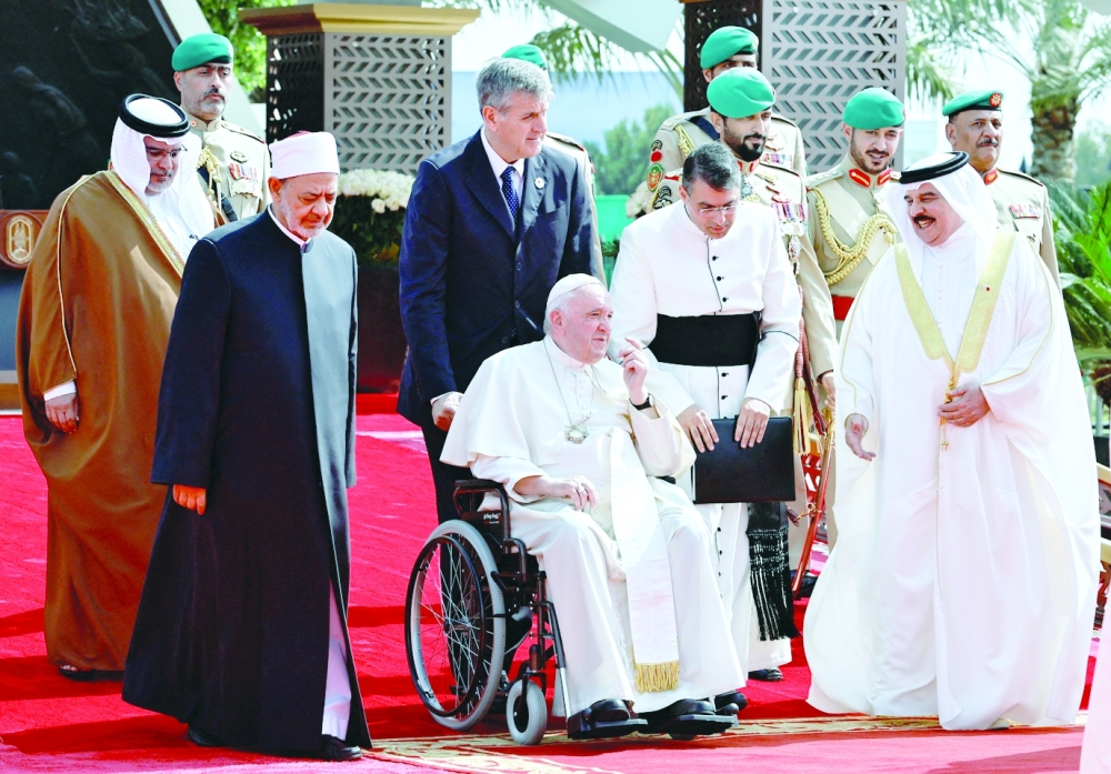 Grand Imam of Al Azhar Ahmed Al Tayeb, Pope Francis and Bahrain's King Hamad bin Isa al Khalifa attend the closing ceremony of the Bahrain Forum for Dialogue: East and West for Human Coexistence at the Sakhir Palace in Manama on Friday. -- Reuters