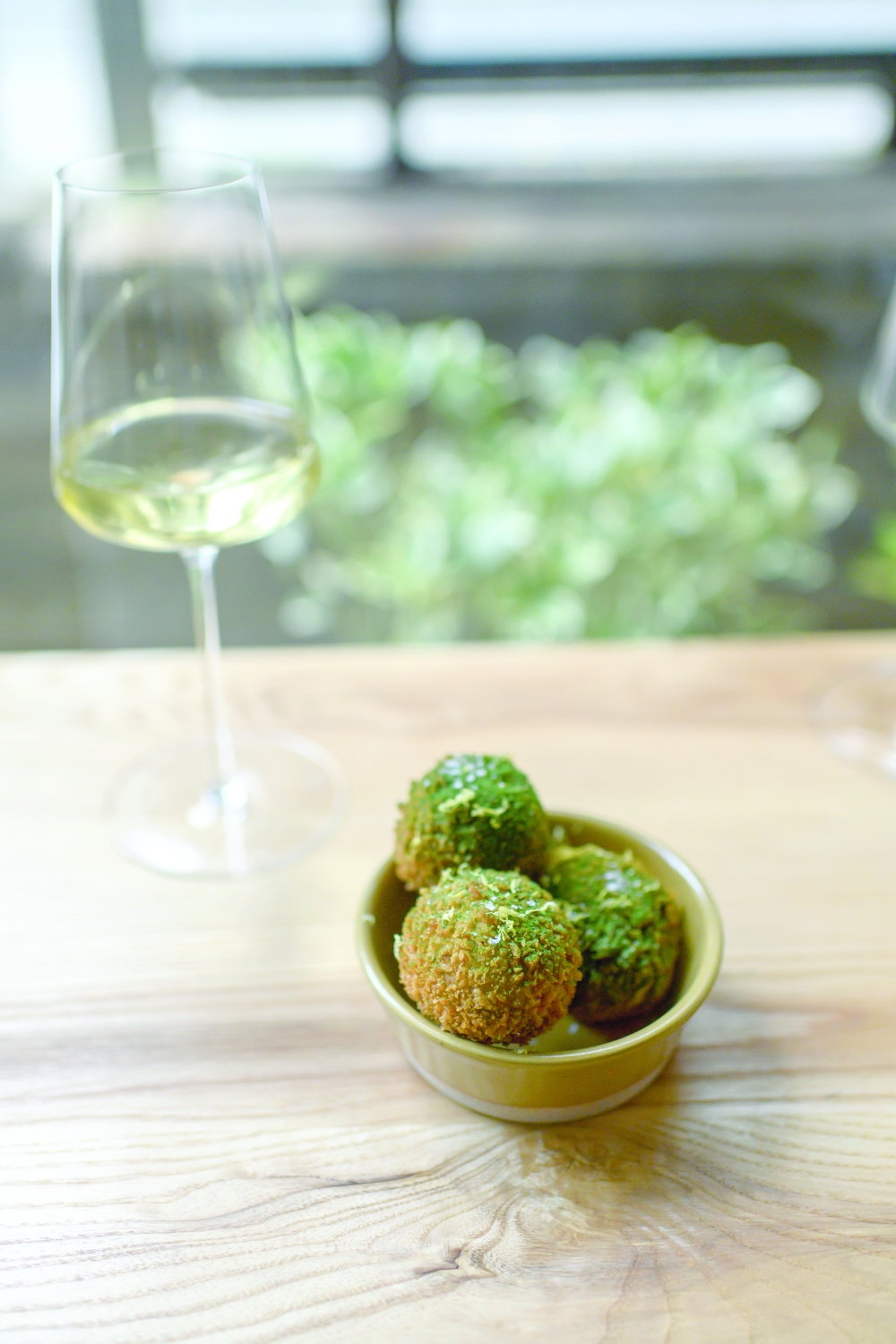 Snail croquettes with hot garlic butter at Claud in New York, Oct. 27, 2022. (Daniel Krieger/The New York Times)