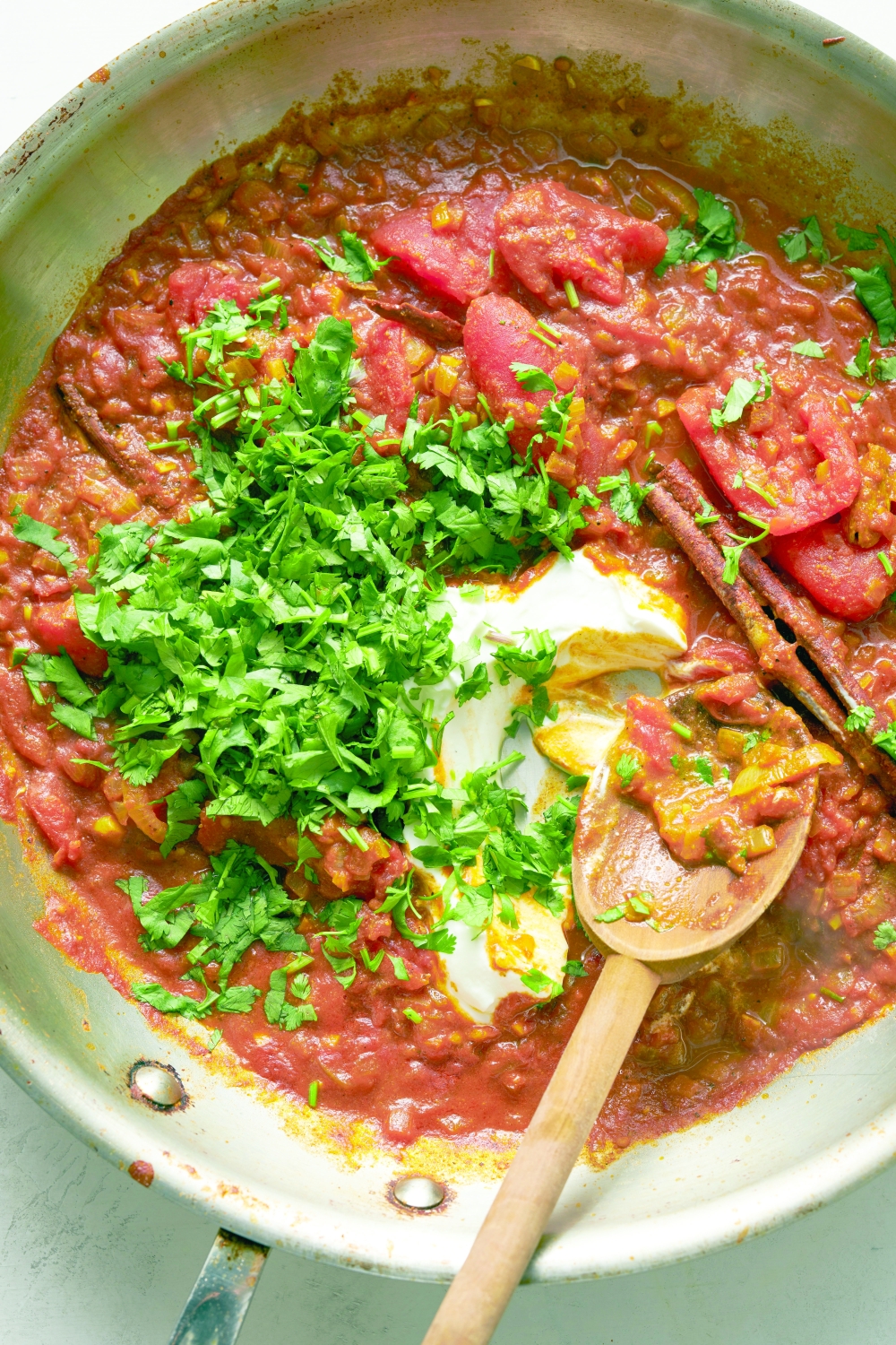 A tomato curry with crispy and creamy paneer from chef Anita Jaisinghani. Food Stylist: Simon Andrews. (David Malosh/The New York Times.)