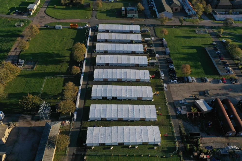 An aerial view shows the Manston short-term holding centre for migrants, near Ramsgate in south east England. -- AFP