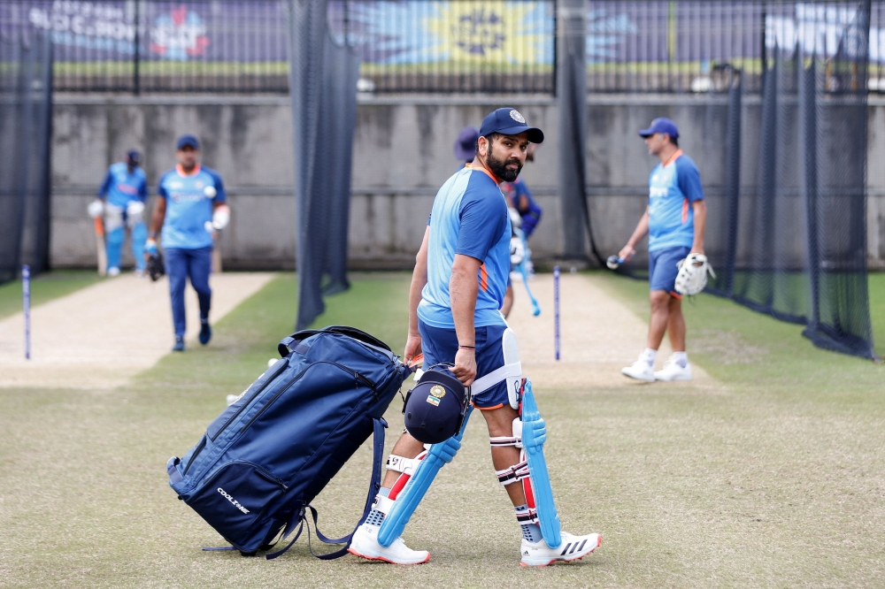 India's captain Rohit Sharma (C) attends a net practice session at Melbourne Cricket Ground (MCG) in Melbourne on November 5, 2022, 