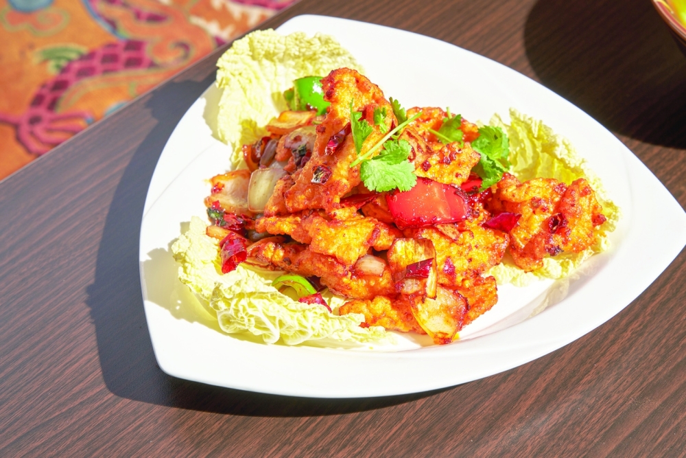 Fiery and crisp mala fish at Nha Sang in Queens, Nov. 2, 2022. (Adam Friedlander/The New York Times)