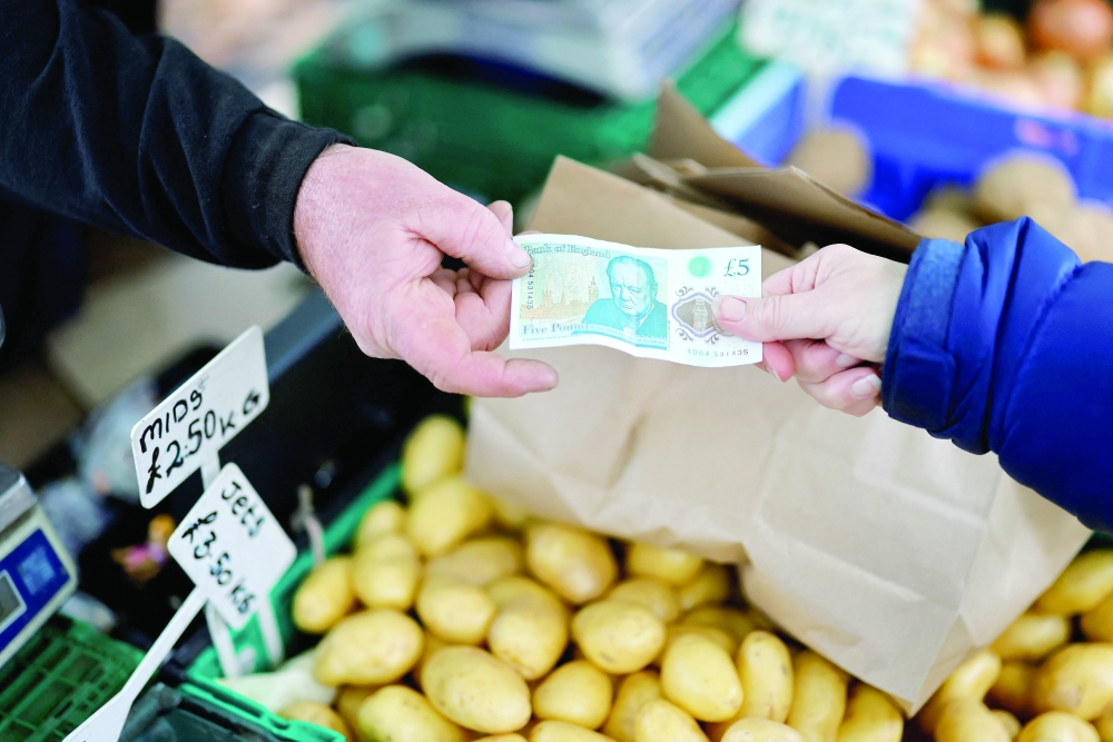 As well as a recession, Britain is facing a cost-of-living crisis with UK inflation at a four-decade high above 10 per cent. -- AFP