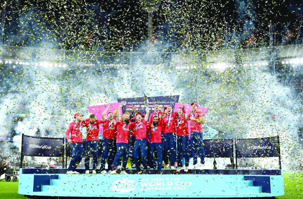Cricket - T20 World Cup - Final - Pakistan v England - Melbourne Cricket Ground, Melbourne, Australia - November 13, 2022 England's Jos Buttler holds aloft the trophy as they celebrate winning the T20 World Cup Joel Carrett/AAP Image via REUTERS     ATTENTION EDITORS - THIS IMAGE WAS PROVIDED BY A THIRD PARTY. NO RESALES. NO ARCHIVES. AUSTRALIA OUT. NEW ZEALAND OUT
