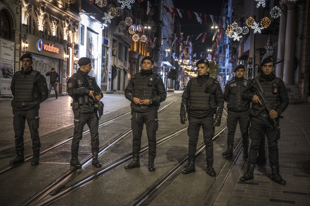 Turkish authorities secure a street near Taksim Square, one of the city’s busiest areas, after an explosion in Istanbul, Turkey, on Sunday, Nov. 13, 2022. (Sergey Ponomarev/The New York Times) 