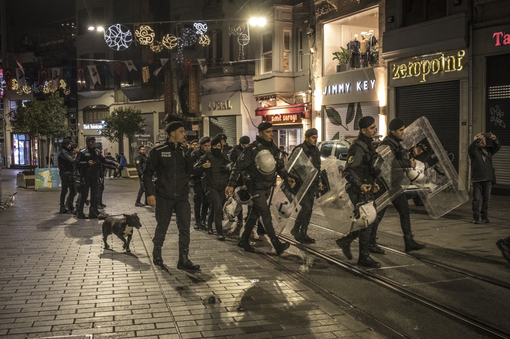 Turkish authorities secure a street near Taksim Square, one of the city’s busiest areas, after an explosion in Istanbul, Turkey, on Sunday, Nov. 13, 2022. (Sergey Ponomarev/The New York Times) 