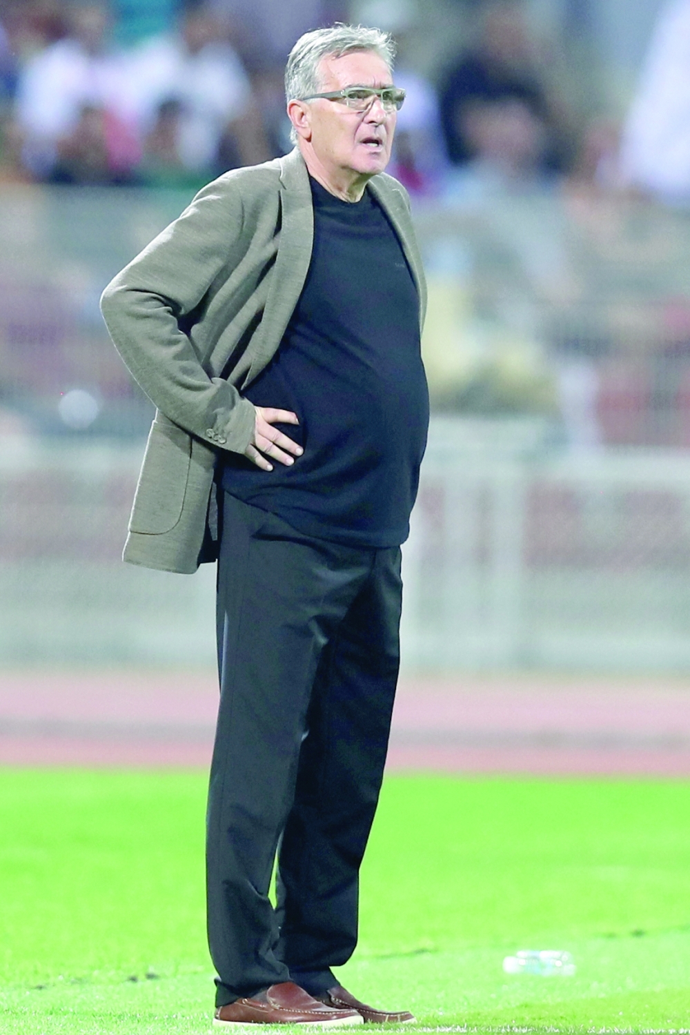Oman's coach Branko Ivankovic watches from the sidelines during a friendly football match between Oman and Germany at the Sultan Qaboos Sports Complex stadium in Muscat on November 16, 2022. (Photo by Haitham AL-SHUKAIRI / AFP)

