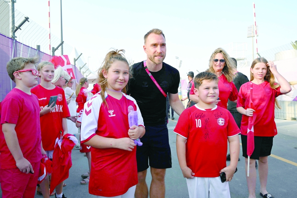 Denmark's midfielder Christian Eriksen meets with fans at Al Sailiya SC in Doha on November 19, 2022, ahead of the Qatar 2022 World Cup football tournament. (Photo by NATALIA KOLESNIKOVA    / AFP)


