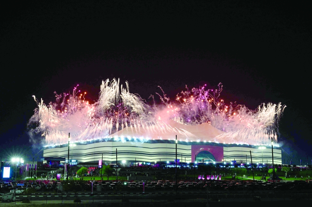 TOPSHOT - A photo shows a fireworks display during the opening ceremony ahead of the Qatar 2022 World Cup Group A football match between Qatar and Ecuador at the Al-Bayt Stadium in Al Khor, north of Doha on November 20, 2022.  (Photo by Miguel MEDINA / AFP)

