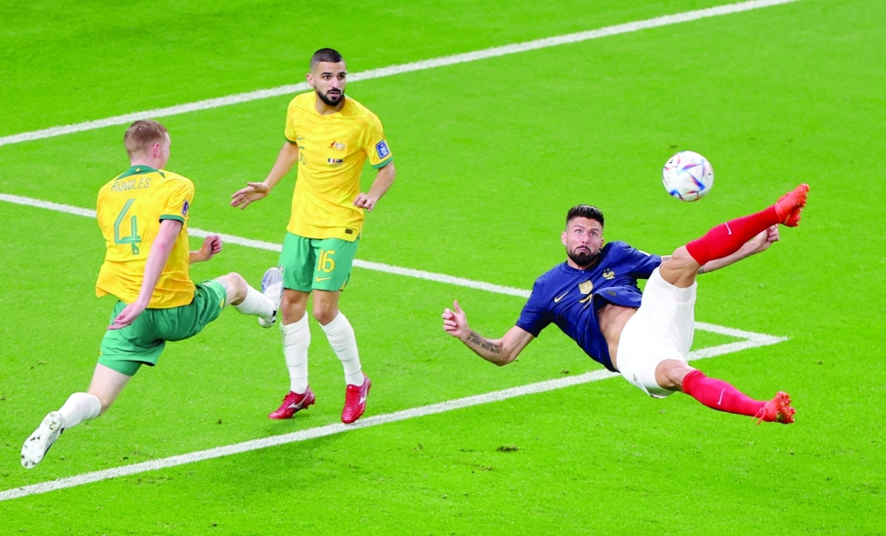 Soccer Football - FIFA World Cup Qatar 2022 - Group D - France v Australia - Al Janoub Stadium, Al Wakrah, Qatar - November 22, 2022 France's Olivier Giroud shoots at goal REUTERS