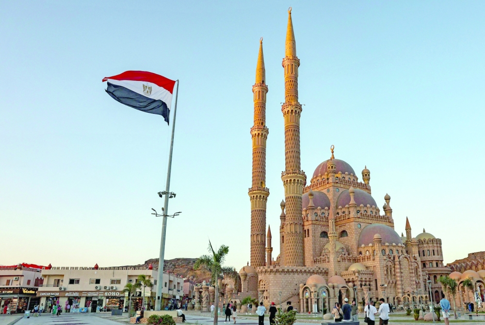 An Egyptian flag flies outside the Grand Mosque of Al-Sahaba (Companions of the Prophet) in Sharm el-Sheikh. — AFP