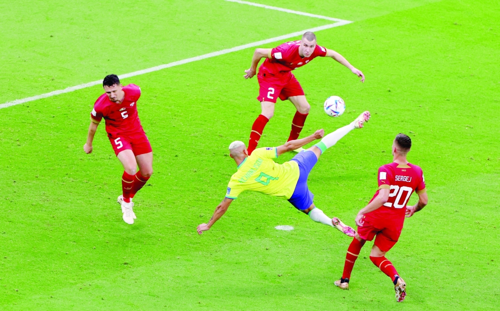 Soccer Football - FIFA World Cup Qatar 2022 - Group G - Brazil v Serbia - Lusail Stadium, Lusail, Qatar - November 24, 2022 Brazil's Richarlison scores their second goal REUTERS/Molly Darlington     TPX IMAGES OF THE DAY
