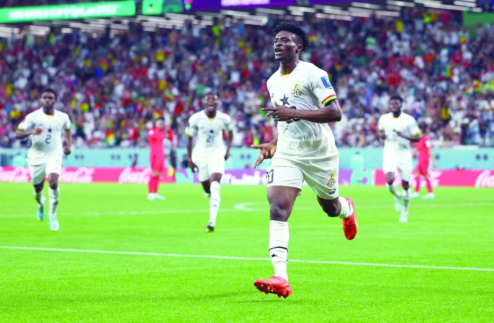 Soccer Football - FIFA World Cup Qatar 2022 - Group H - South Korea v Ghana - Education City Stadium, Al Rayyan, Qatar - November 28, 2022 Ghana's Mohammed Kudus celebrates scoring their third goal REUTERS/Molly Darlington

