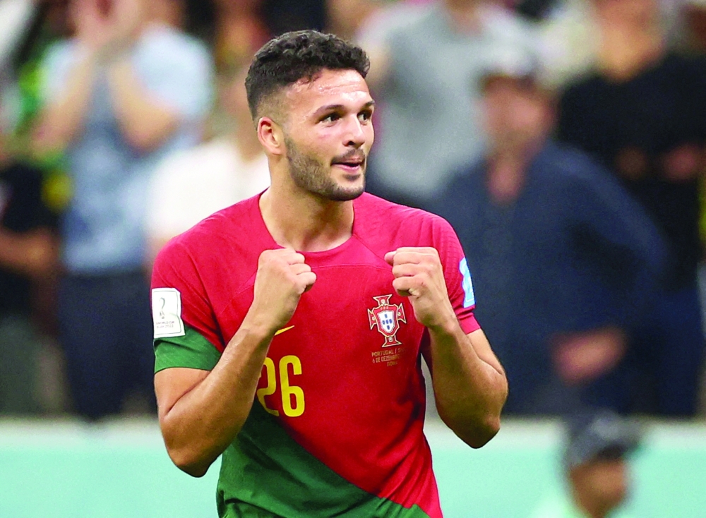 Soccer Football - FIFA World Cup Qatar 2022 - Round of 16 - Portugal v Switzerland - Lusail Stadium, Lusail, Qatar - December 6, 2022 Portugal's Goncalo Ramos celebrates scoring their fifth goal and his hat-trick REUTERS