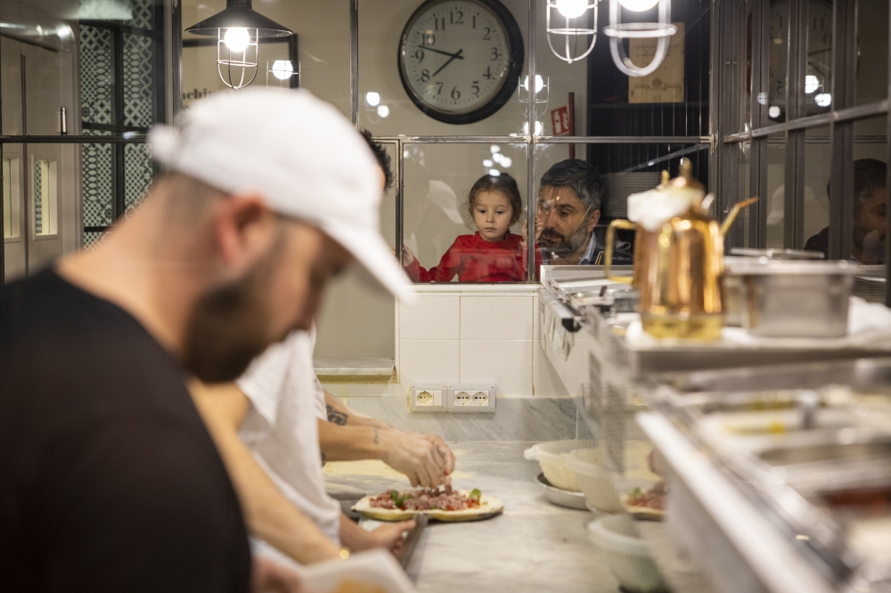 Pizza-makers at work at I Masanielli in Caserta, Italy, in October 2022. (Roberto Salomone/The New York Times)