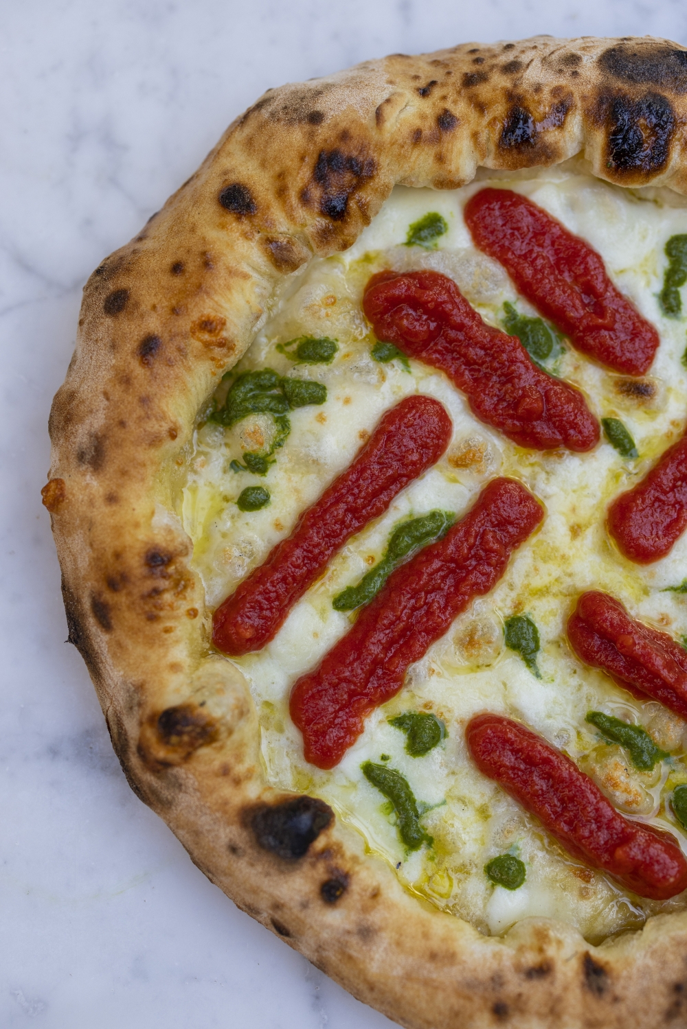 A margherita Sbagliata (incorrect margherita) at the Pepe in Grani pizzeria in Caiazzo, in the province of Caserta, Italy, in October 2022. (Roberto Salomone/The New York Times)