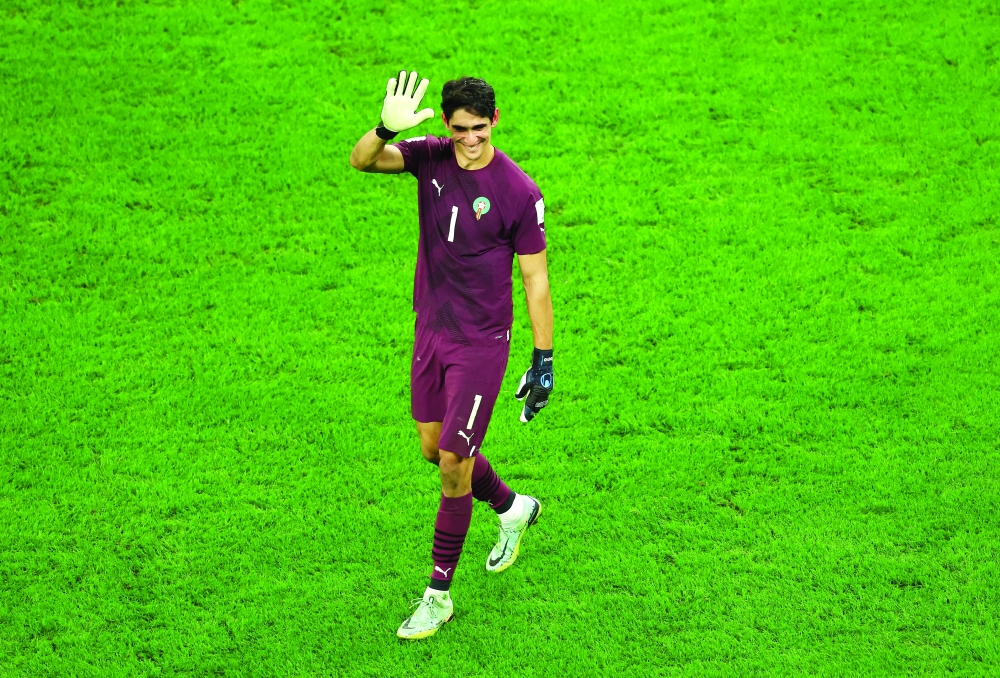 Soccer Football - FIFA World Cup Qatar 2022 - Round of 16 - Morocco v Spain - Education City Stadium, Al Rayyan, Qatar - December 6, 2022 Morocco's Yassine Bounou celebrates qualifying for the quarter finals REUTERS/Lee Smith
