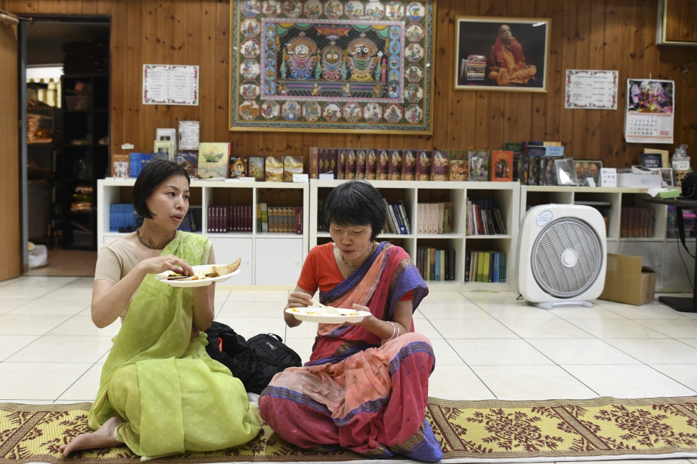 A meal after a Sunday prayer service at the Hare Krishna temple in Edogawa Ward of Tokyo, Sept. 18, 2022. .  (Noriko Hayashi/The New York Times) 
