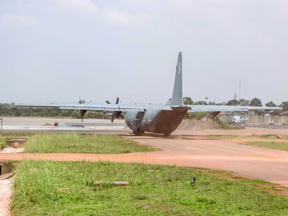 The last 47 French soldiers of the logistics mission take off on a C130 cargo plane at Bangui airport on Thursday. -- AFP