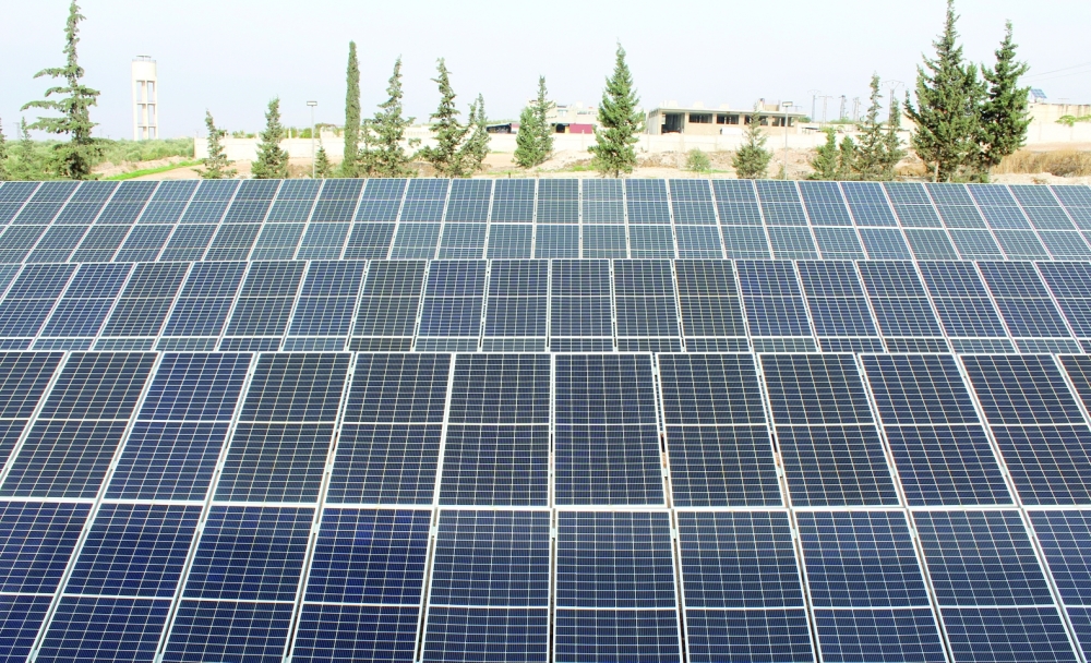 Solar panels are pictured inside Syrian businessman Baraa Sheira's solar farm in Hama, Syria. — Reuters