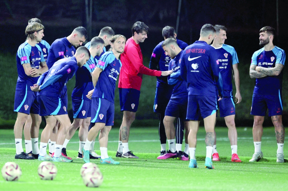 Croatia's players take part in a training session at Al Erssal Training Site 3 in Doha on December 15, 2022, ahead of their third place play-off match against Morocco on December 17 during the Qatar 2022 World Cup football tournament.  (Photo by JACK GUEZ / AFP)

