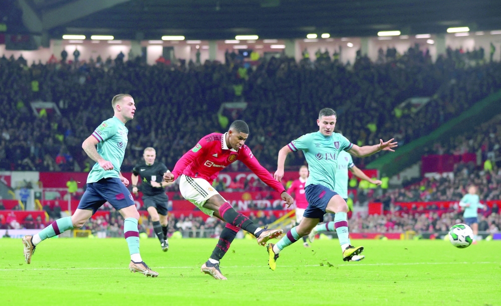 Soccer Football - Carabao Cup - Round of 16 - Manchester United v Burnley - Old Trafford, Manchester, Britain - December 21, 2022 Manchester United's Marcus Rashford scores their second goal Action Images via Reuters